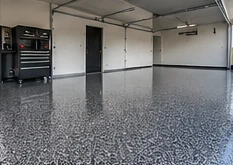 Illustrative gray flake epoxy garage floor